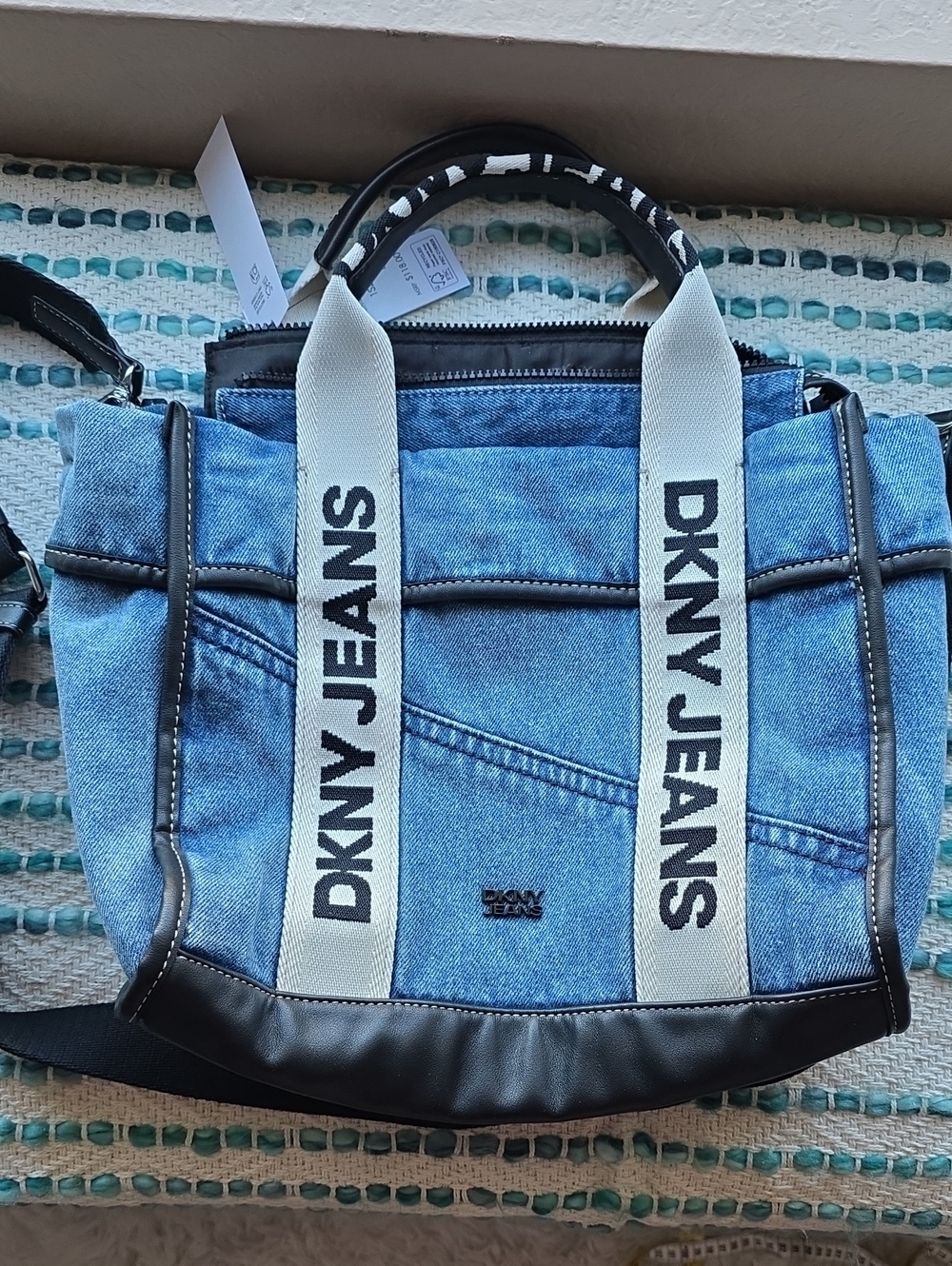 Dkny Blue Denim Messenger Bag with Black Trim and White Logo Straps